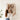Person holding a gum tree bark photography print on a white wall