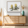 Banksia flowers framed artwork styled in a neutral bedroom interior